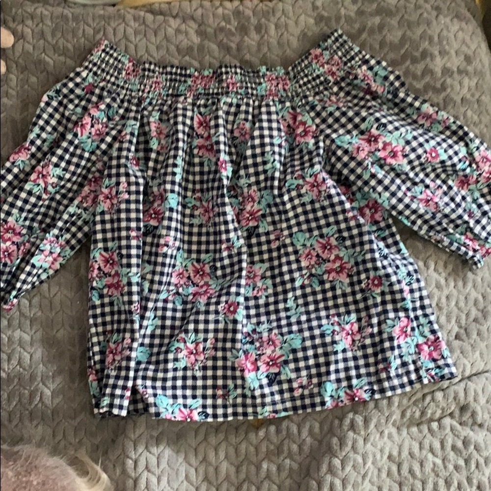 Off the shoulder checkered top with flowers.